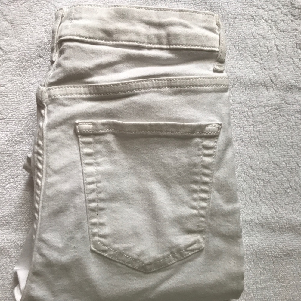 White Knee-Ripped Jeans